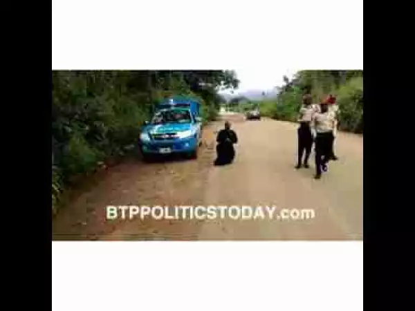 A Clergyman Kneels Down To Beg FRSC Officials (Video)